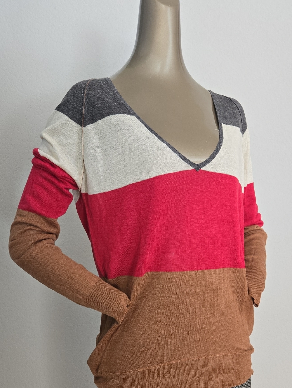 Colorblock V‑Neck Sweater in Red, Brown, Cream, and Gray